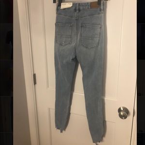 American Eagle light ripped curvy girl jeans